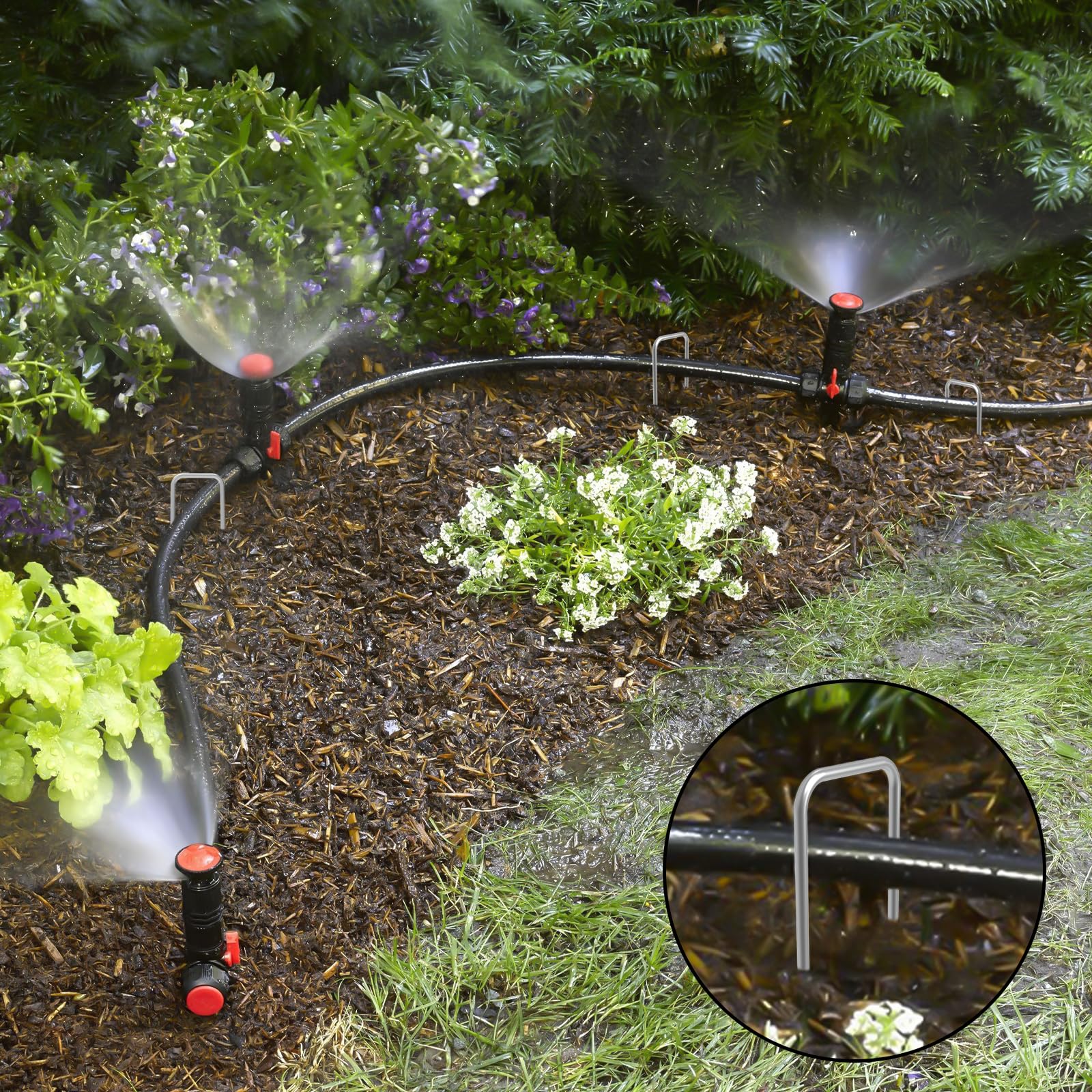 Heavy-duty landscape staples securing irrigation pipes and landscape fabric in yard - professional ground anchor guide