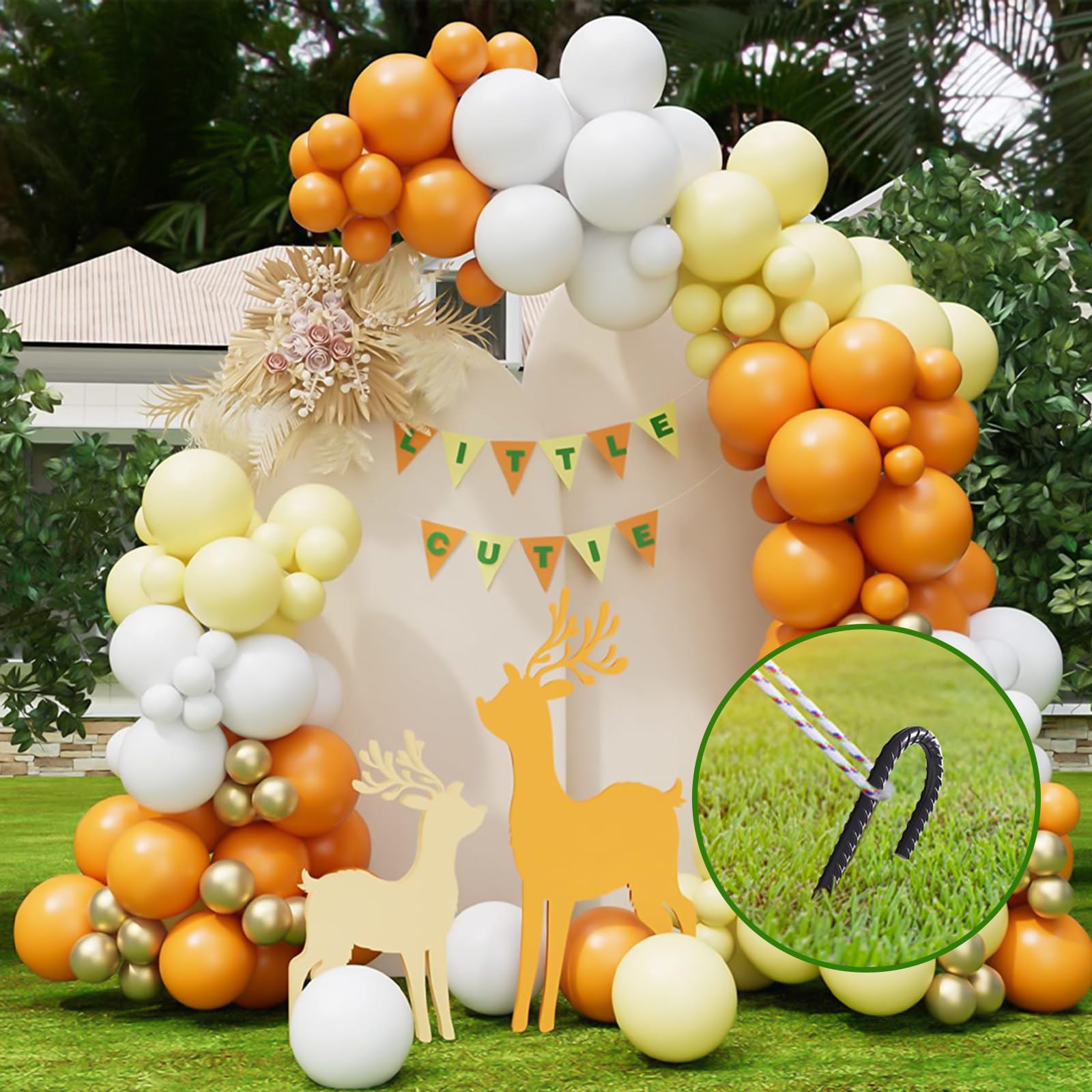 Securing wedding board with black J-hook rebar stakes in outdoor setting